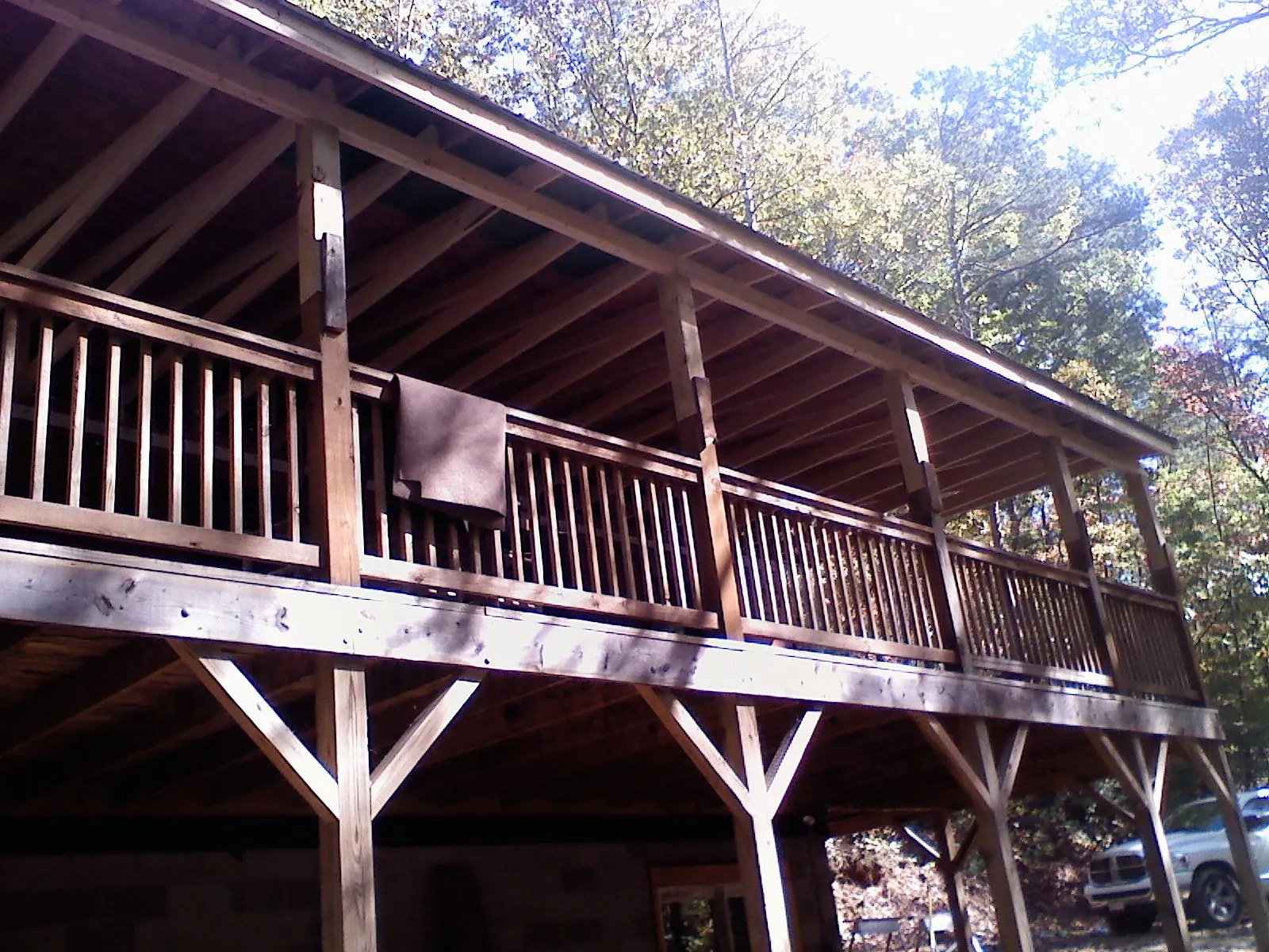 Timber framing under a new elevated porch and deck — Roof Leak Repair in Mine Hill by Roofing Brothers